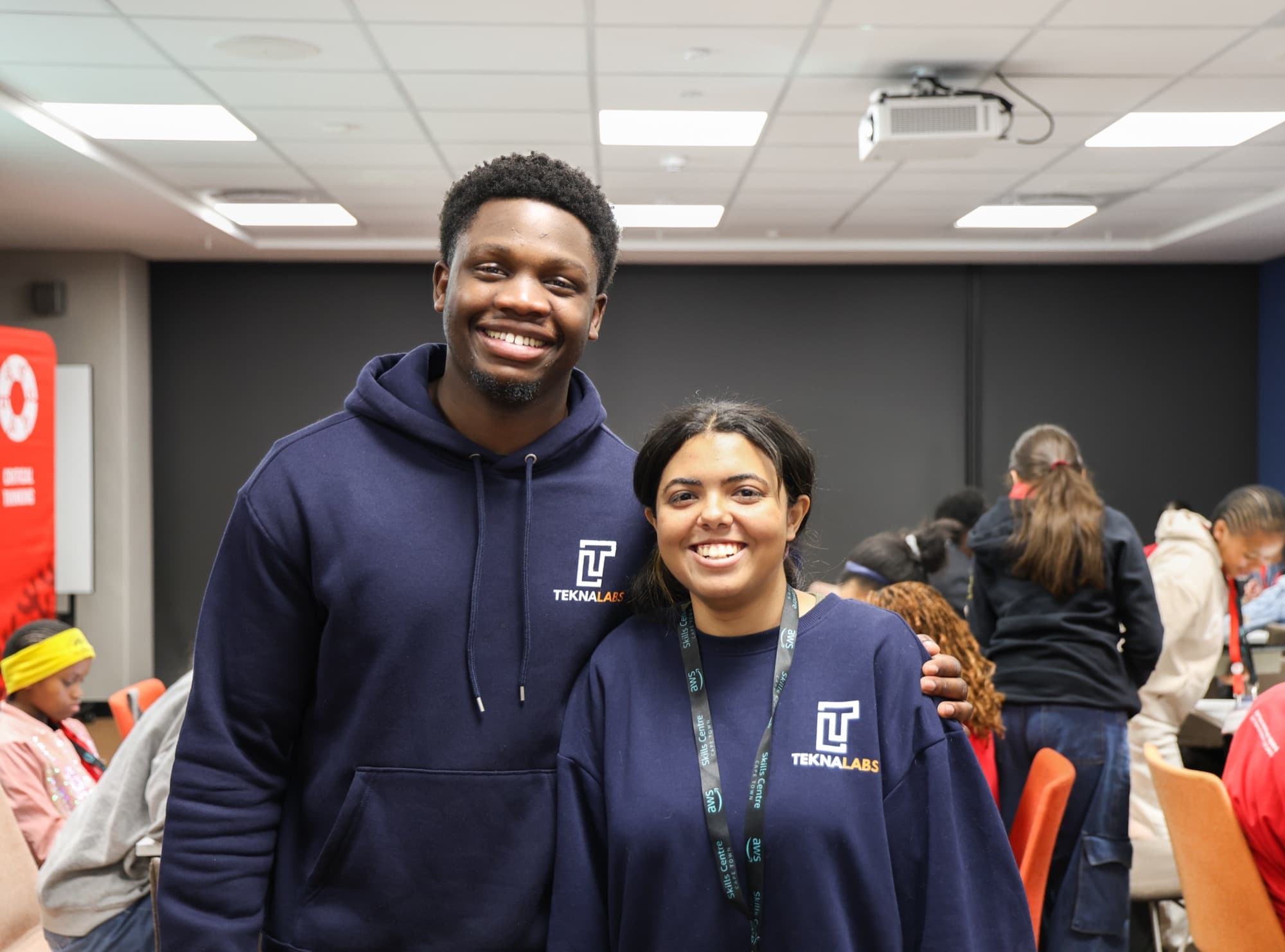 David smiling with a TeknaLabs colleague at the AWS Skills Centre