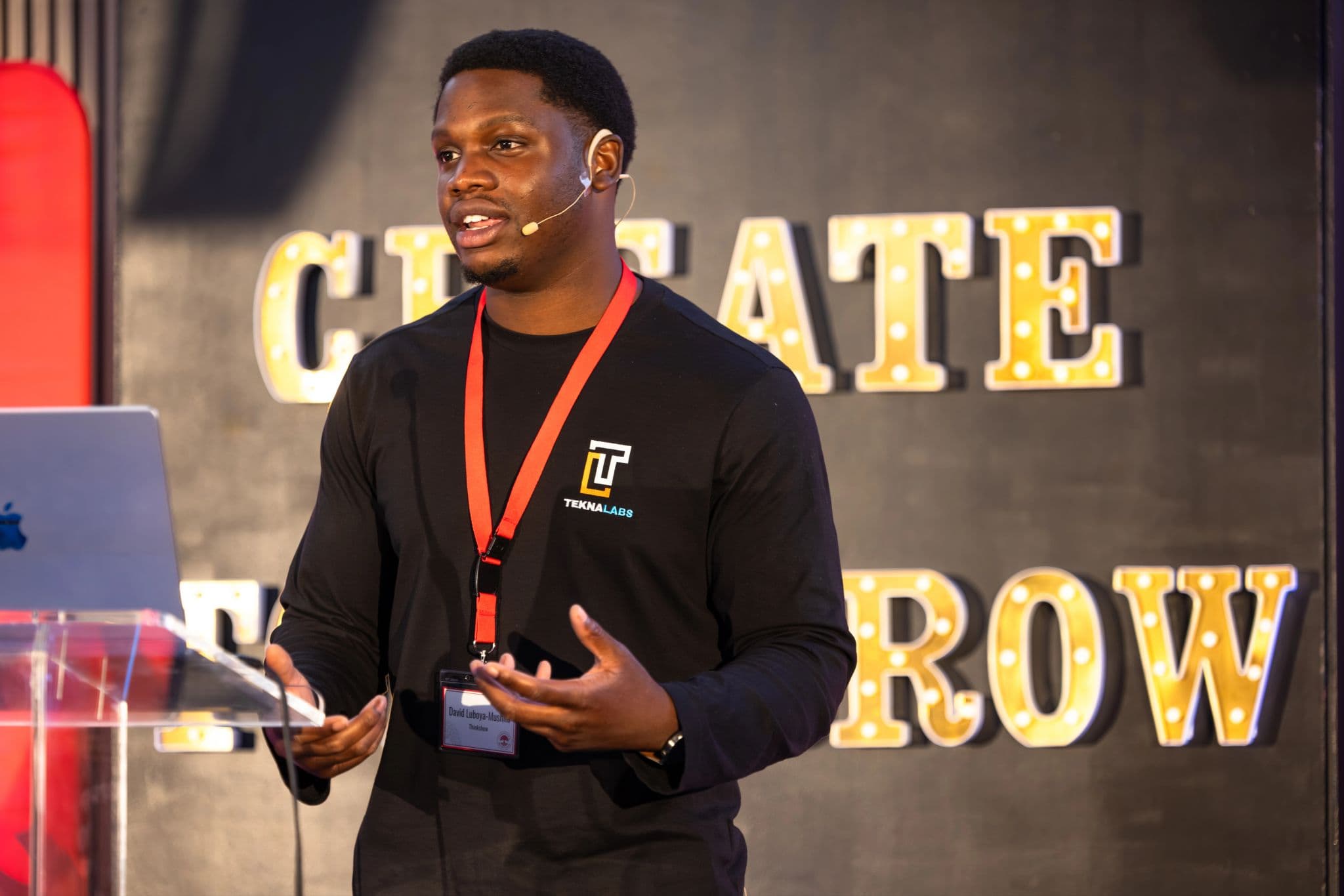 David on stage at a TeknaLabs event